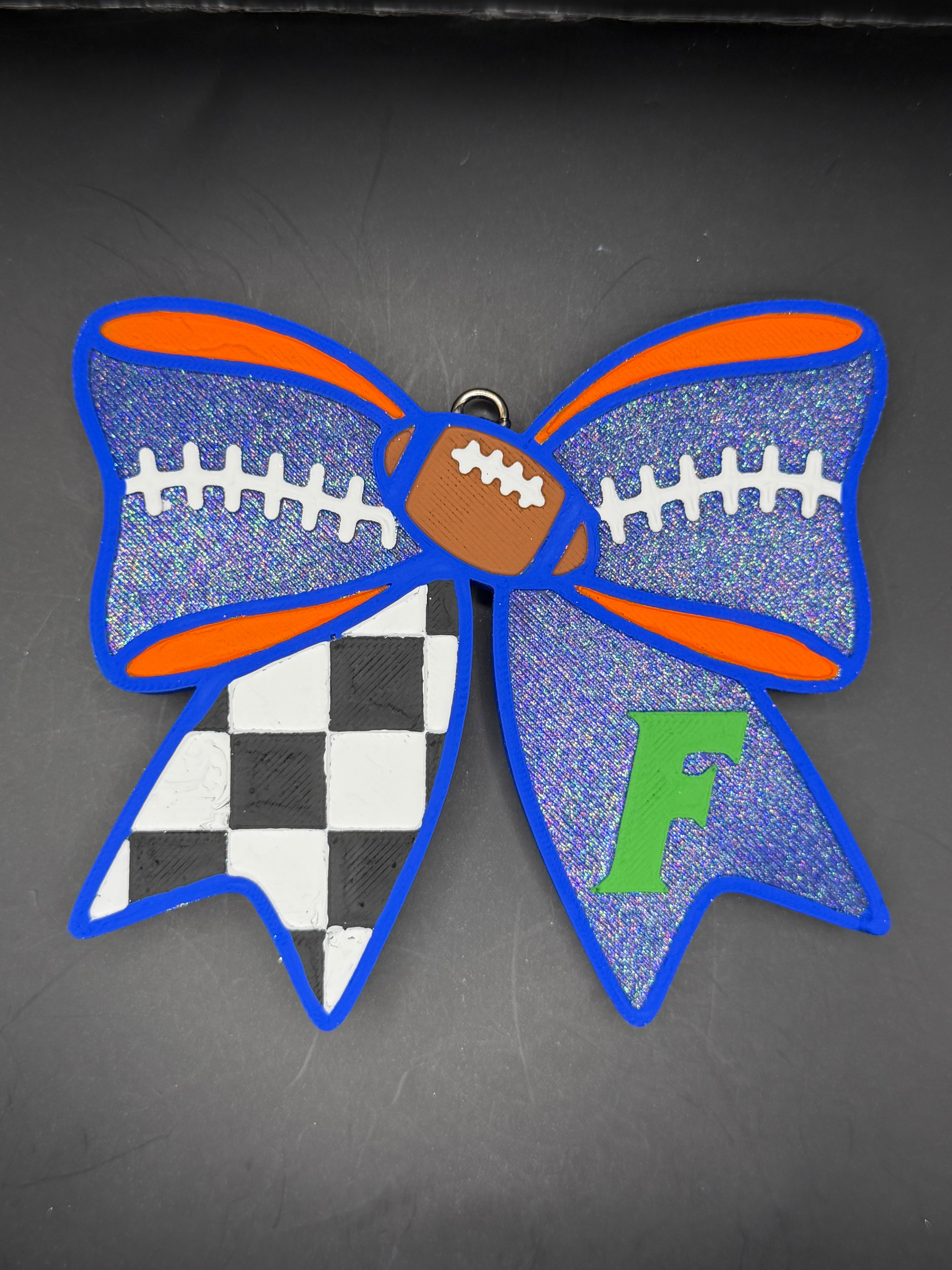 Orange and blue bow
