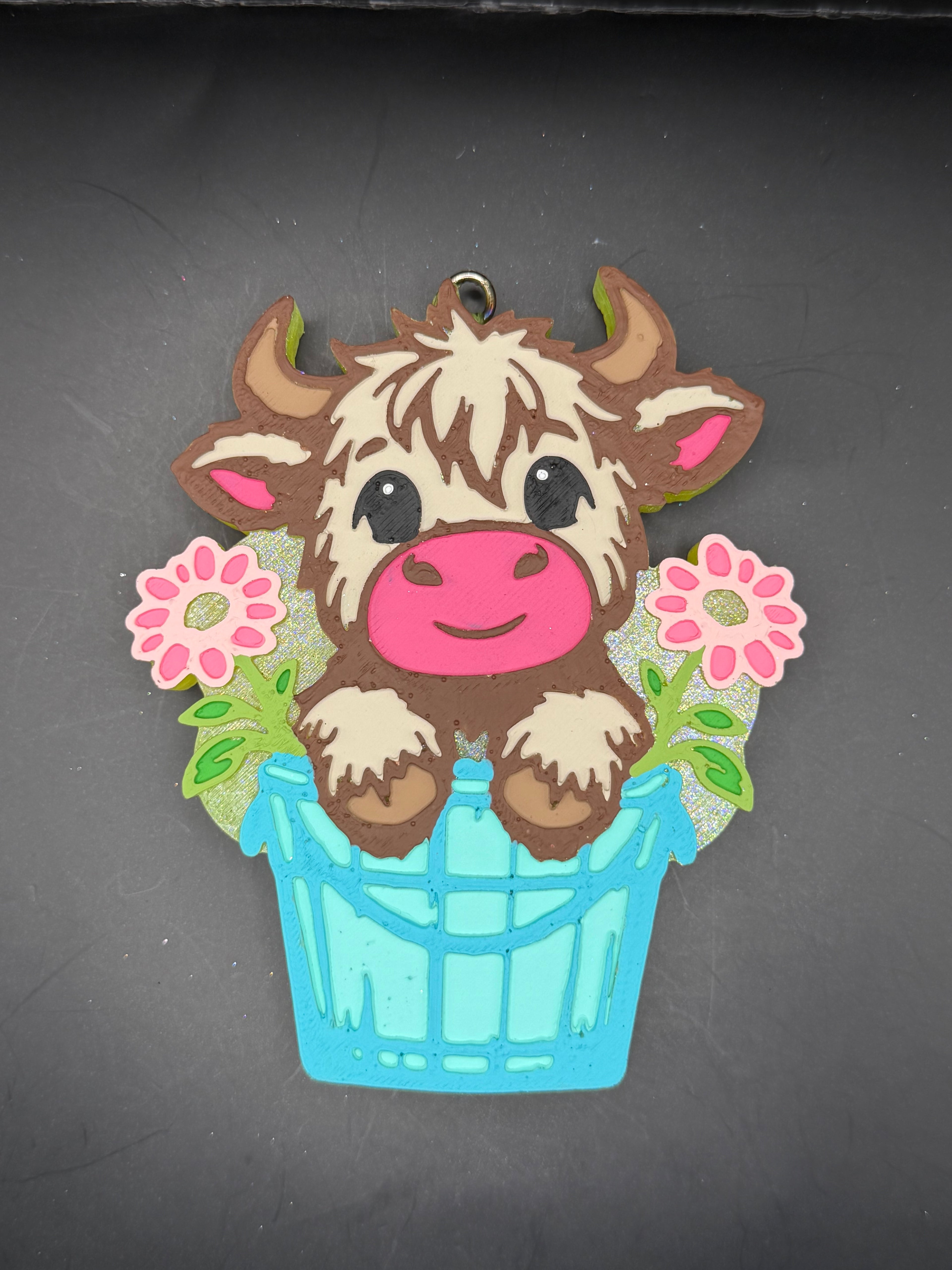 Cutie cow in bucket